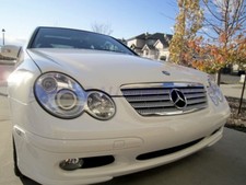 SPORTCOUPE FARI ANTERIORI LENTICOLARI  CROMO E NERI MERCEDES CLASSE C CL203 W203