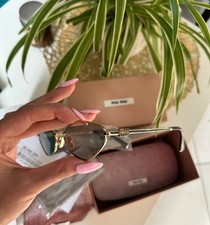 Occhiali da sole Miu Miu MU