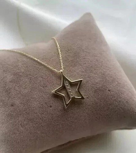 Ciondolo stella donna diamante