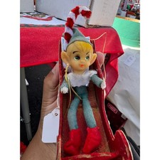 Elfo pixie vintage in slitta di velluto 