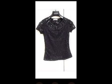 Maglietta maglia in pizzo nero, perfetta per una serata elegante o un'occasione 