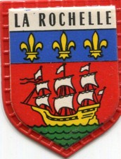 Ecusson plastique LA ROCHELLE N° 69 Au dos pub Regilait