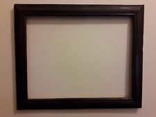 Cornice antica in legno scuro