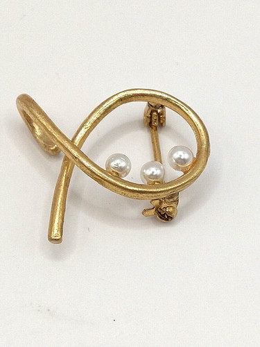 Spilla stile vintage finta