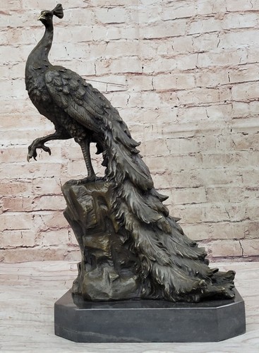 Fatto mano pavone bronzo - mano,