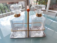 Coppia di bottiglie quadrate