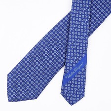 Cravatta Salvatore Ferragamo cravatta in seta logo Gancini e floreale su...