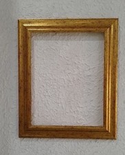 Cornice  di legno  oro brunito misura interna 50x70