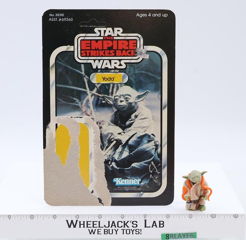 Yoda con serpente arancione