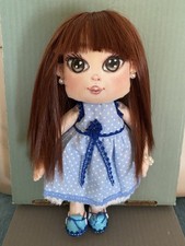 Bambola artigianale di stoffa