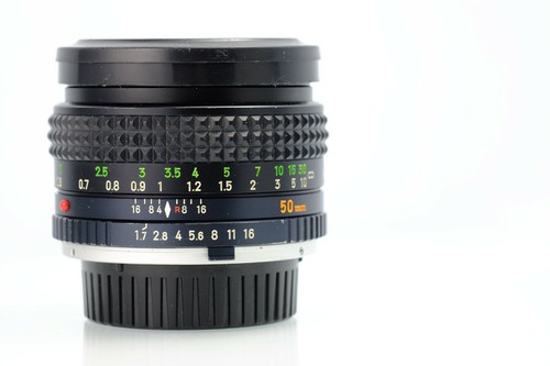 Minolta 50mm in - in, good