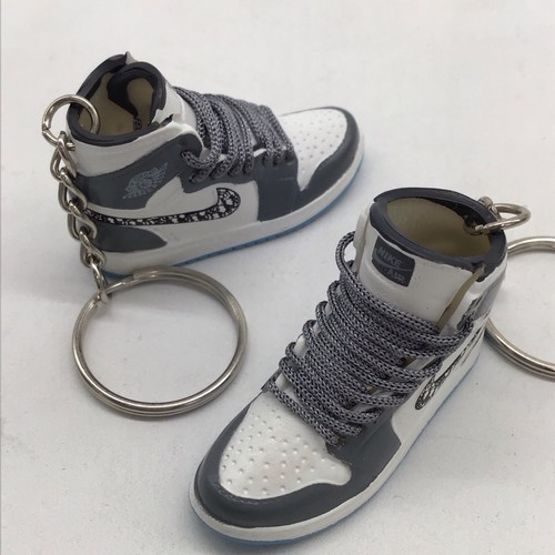 Coppia portachiavi sneaker - di,