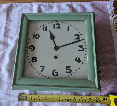 Vintage pendulum wall clock