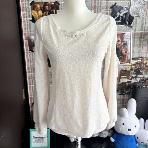 Top ritaglio spalle maniche
