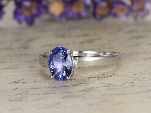 Anello solitario - , di