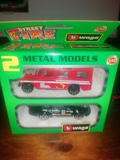 Bburago 1/43 2 pack with Land Rover Aziza + Porsche 911 #11 black