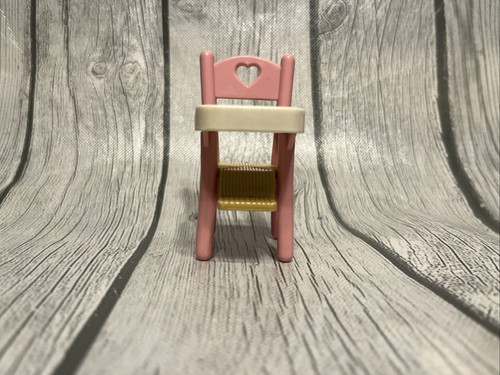 Seggiolone rosa bambina casa