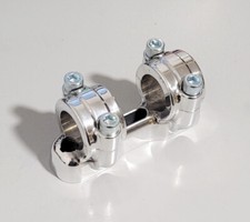 Riser stretti per manubri