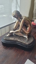 Statua donna lamina - di,