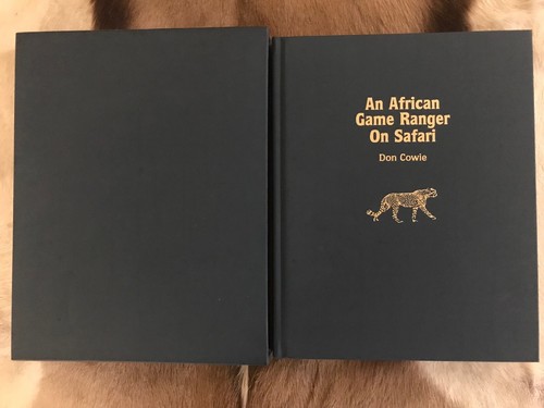 African game ranger on - game,