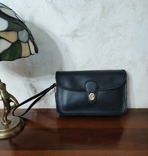 Coach vintage turnlock wristlet nera restaurata