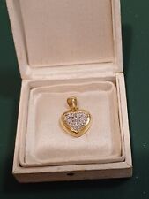 Ciondolo a forma di cuore in oro 18Kt.e zirconi