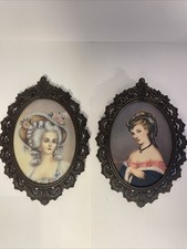 2 cornice in bronzo ovale con stampe artistiche, quadretti vintage.