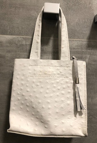 Pochette vera pelle - in,