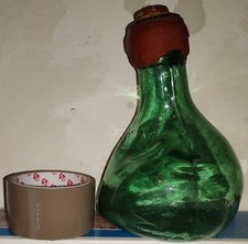 Vecchia bottiglia verde vetro