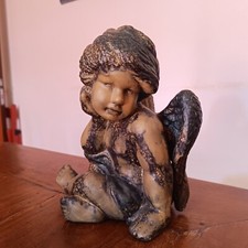 Scultura in metallo angelo