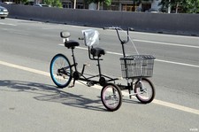 Bicicletta a pedale tandem
