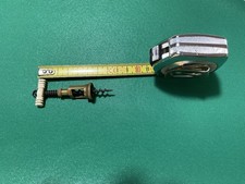 Antico cavatappi in miniatura 