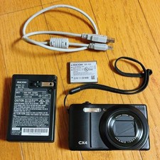 Fotocamera digitale compatta RICOH CX4 nera zoom 10 MP 10,7x testata eccellente