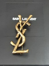 Spilla unica YSL bronzo