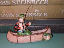 Uomo pesca a mosca trota