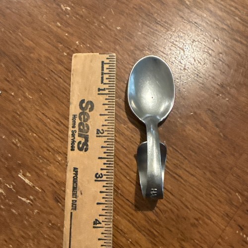 Cucchiaio bambino manico curvo