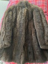 Pelliccia Opossum  colore marrone scuro, taglia 44.