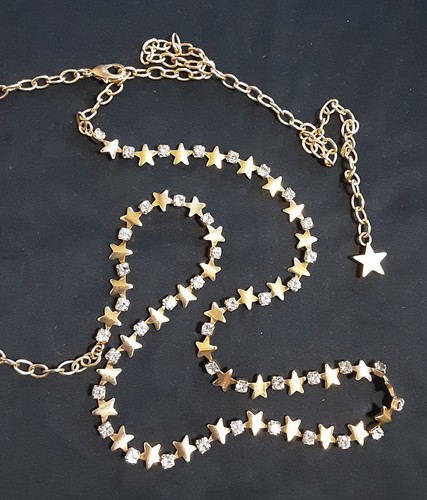 Collana dorata con - , stelline