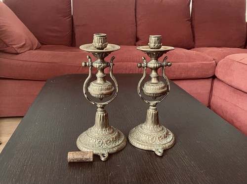 Coppia antichi candelabri - di,