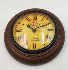 Orologio da parete in legno