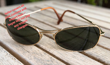 Occhiali da sole vintage "Giorgio Armani" con incisioni. Made in Italy