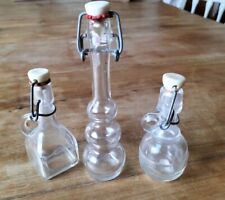3 simpatiche BOTTIGLIE VINTAGE DA COLLEZIONE in vetro con tappo di varie forme