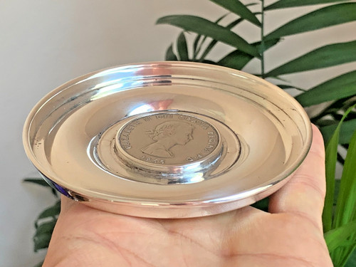 Spilla sottobicchiere vino