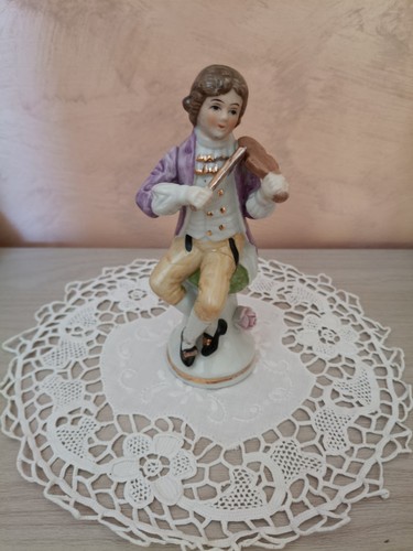 Vecchia statuetta violinista