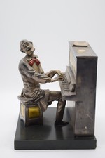 Statua scultura pianista