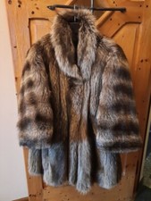 Pelliccia lunga , vera marmotta  colore naturale usata pochissimo