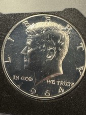 capelli accentati kennedy 1964