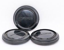 1X TAPPO OLYMPUS OM  ORIGINALE PER CORPO FOTOCAMERA OM1 OM10 OM40 ECC.
