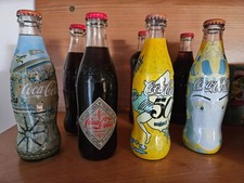 7 Bottiglie in vetro Coca Cola