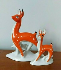 Coppia di statuine di cervi in